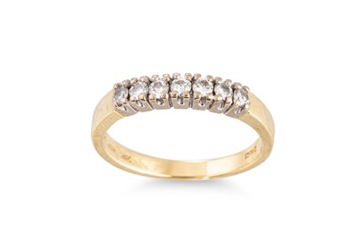 Lot 152 - A SEVEN STONE DIAMOND RING, mounted in 18ct...