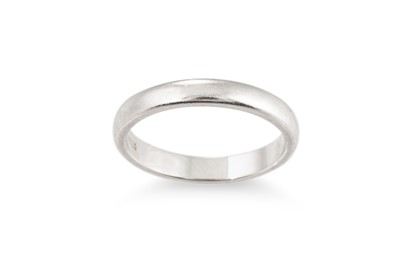 Lot 63 - A MODERN TIFFANY & CO. PLATINUM BAND RING,...