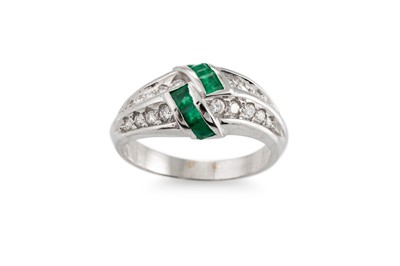Lot 208 - AN EMERALD AND DIAMOND RING, mounted in 18ct...