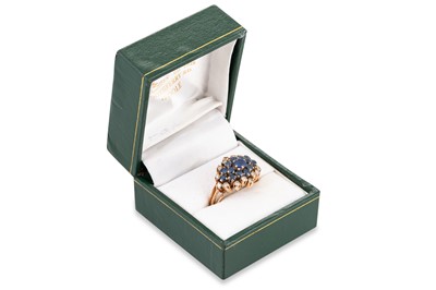 Lot 374 - A SAPPHIRE AND DIAMOND CLUSTER RING, mounted...