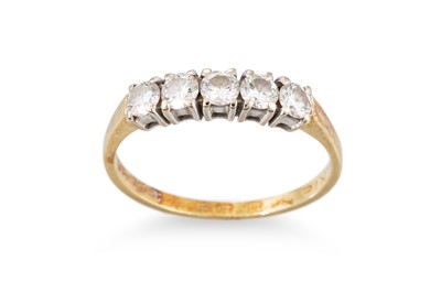Lot 251 - A DIAMOND FIVE STONE RING, the round brilliant...