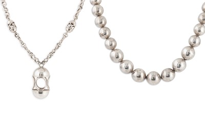 Lot 499 - TWO STERLING SILVER HEAVY NECKLACES,...