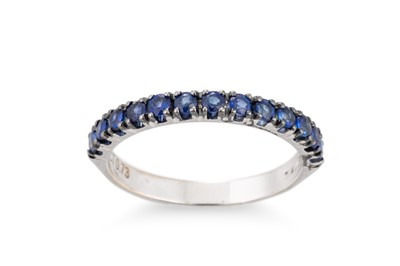 Lot 161 - A SAPPHIRE HALF ETERNITY RING, the round cut...