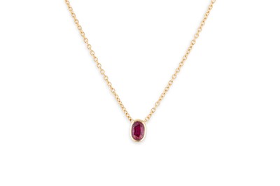 Lot 163 - A RUBY SET PENDANT, the oval cut ruby to bezel...
