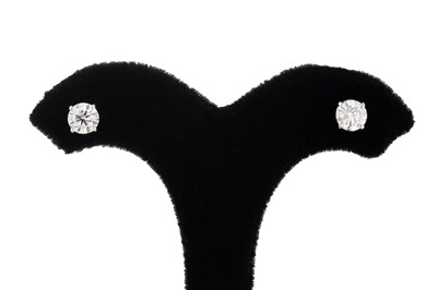 Lot 240 - A PAIR OF DIAMOND STUD EARRINGS, the round...