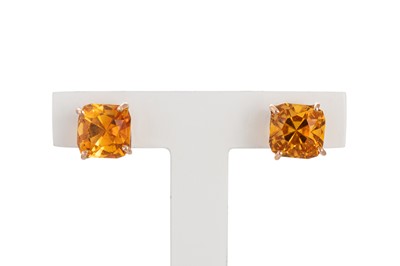 Lot 271 - A PAIR OF CITRINE STUD EARRINGS, mounted in...