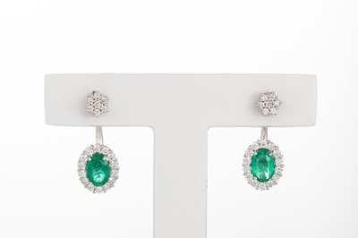 Lot 272 - A PAIR OF EMERALD AND DIAMOND EARRINGS, each...