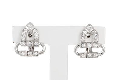 Lot 273 - A PAIR OF DIAMOND STUD EARRINGS, of shaped...