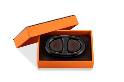 Lot 525 - AN HÉRMES SILK SCARF, boxed with scarf clip