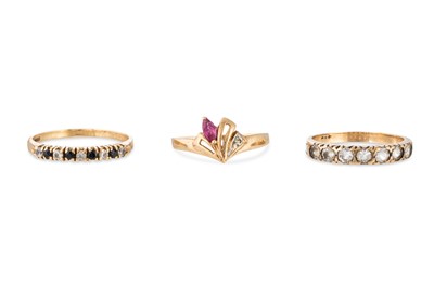Lot 127 - THREE 9CT GOLD STONE SET RINGS, weight 5.4 g....
