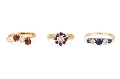 Lot 131 - THREE 18CT GOLD GEM SET RINGS, weight 8.4 g....