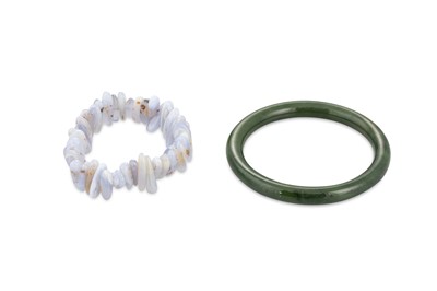 Lot 114 - A JADE BANGLE, together with a stone set...