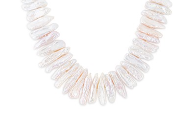 Lot 28 - A MOTHER-OF-PEARL NECKLACE, silver clasp