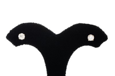Lot 113 - A PAIR OF DIAMOND STUD EARRINGS, one old cut...