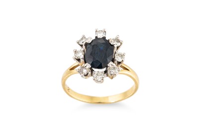 Lot 212 - A SAPPHIRE AND DIAMOND CLUSTER RING, the...