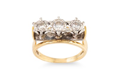 Lot 213 - A DIAMOND THREE STONE DRESS RING, to aN 18ct...