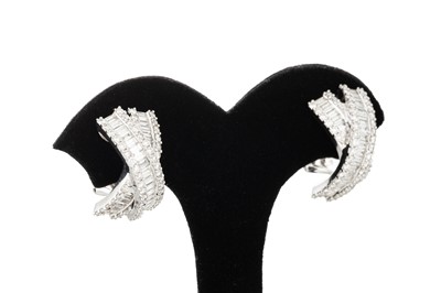 Lot 234 - A PAIR OF DIAMOND CLUSTER EARRINGS, set with...