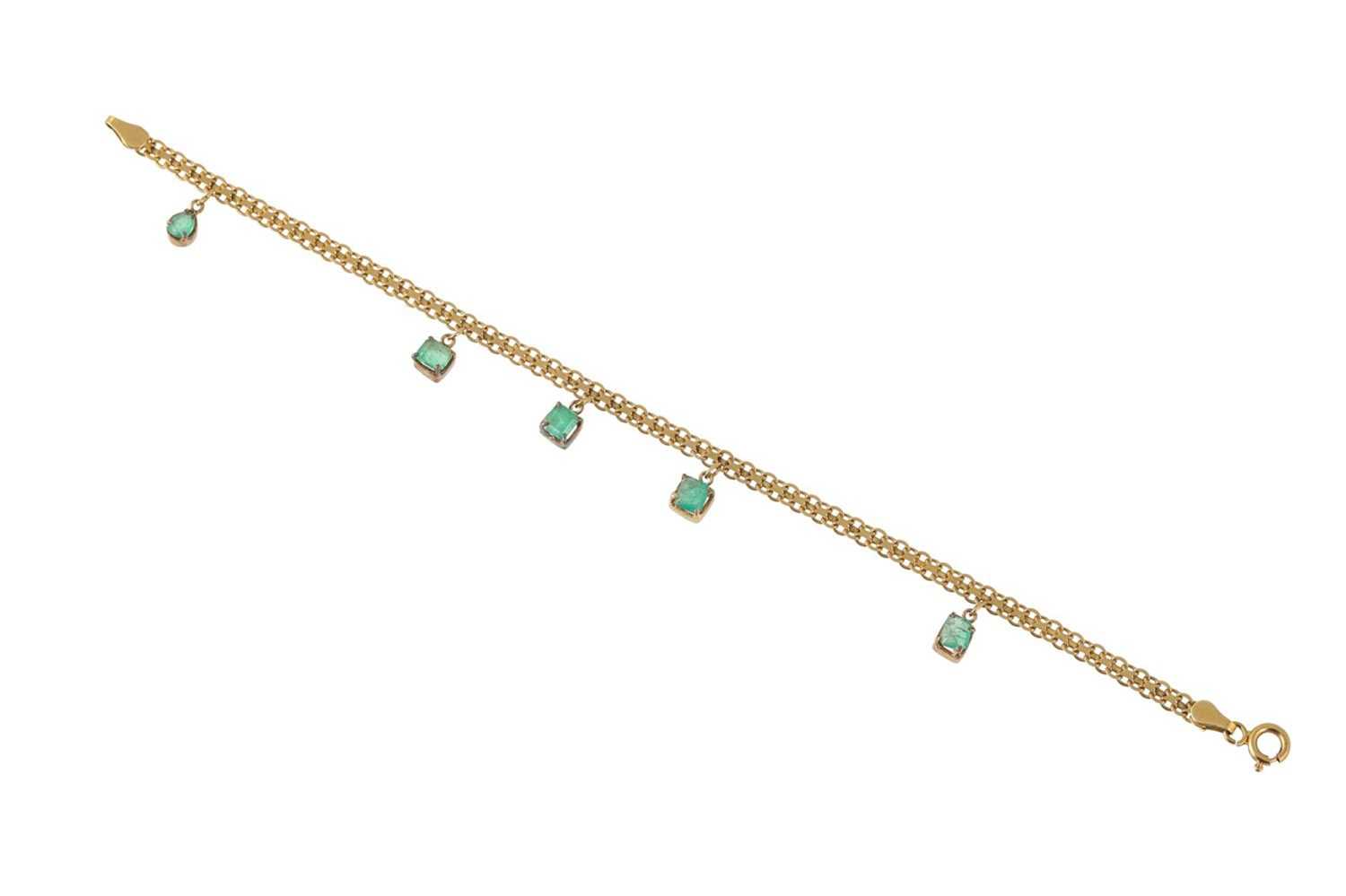 Lot 107 - AN EMERALD BRACELET, mounted in 18ct yellow...