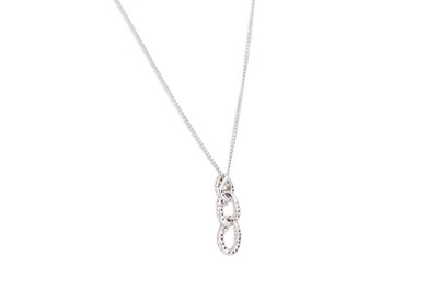 Lot 315 - A DIAMOND PENDANT, modelled in 9ct white gold,...