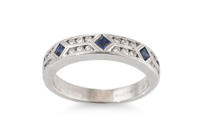 Lot 323 - A DIAMOND AND SAPPHIRE BAND RING, mounted in...