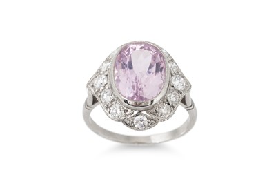 Lot 300 - A KUNZITE AND DIAMOND CLUSTER RING, the oval...