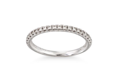 Lot 4 - A DIAMOND SET BAND RING, mounted in platinum....