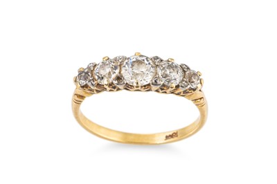 Lot 383 - A GRADUATED FIVE STONE DIAMOND RING, mounted...