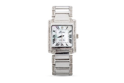 Lot 429 - A SILVER DIAMOND SET CERAMIC WRISTWATCH,...