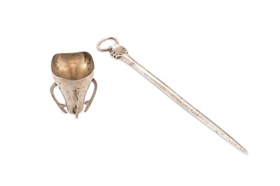 Lot 431 - A SMALL IRISH SILVER CUP, three legs, together...