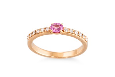Lot 179 - A PINK SAPPHIRE AND DIAMOND RING, the oval...
