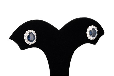 Lot 271 - A PAIR OF DIAMOND AND SAPPHIRE CLUSTER...