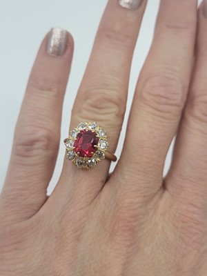 Lot 353 - A VINTAGE RED SPINEL & DIAMOND CLUSTER RING,...