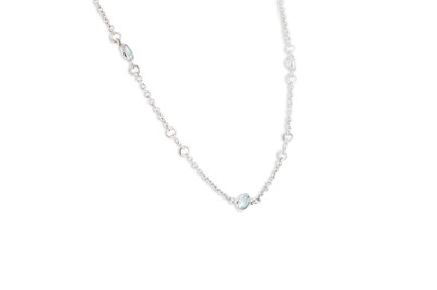 Lot 121 - AN AQUAMARINE AND DIAMOND SET CHAIN, the...
