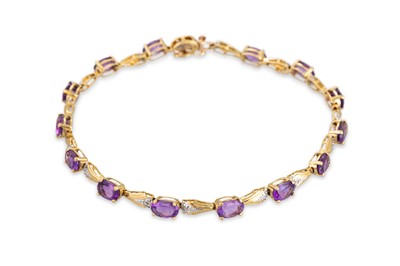 Lot 13 - AN AMETHYST AND DIAMOND SET BRACELET, the oval...