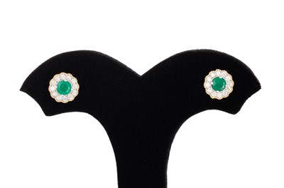 Lot 16 - A PAIR OF EMERALD AND DIAMOND SET CLUSTER...