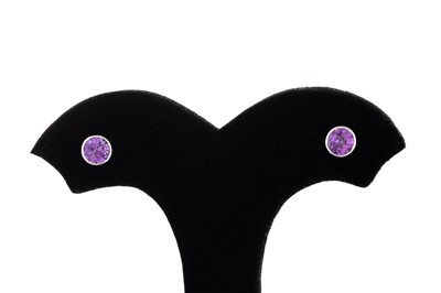 Lot 25 - A PAIR OF AMETHYST STUD EARRINGS, the round...