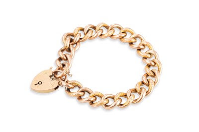 Lot 30 - AN ANTIQUE 9CT GOLD CURB LINK BRACELET, with...