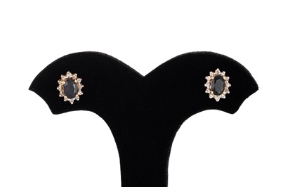 Lot 34 - A PAIR OF SAPPHIRE AND DIAMOND CLUSTER...