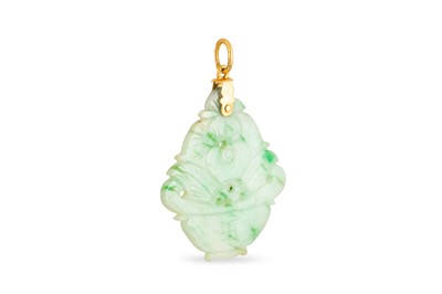 Lot 75 - A JADE SET CARVED PENDANT, with gold fittings...