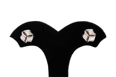 Lot 76 - A PAIR OF KNOT EARRINGS, mounted in 9ct white...