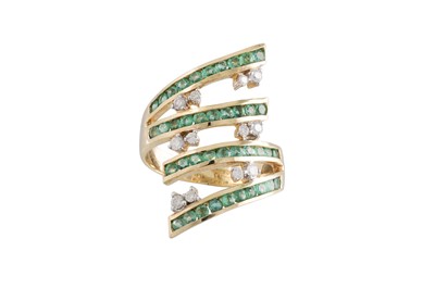 Lot 230 - AN EMERALD AND DIAMOND RING, the channel set...