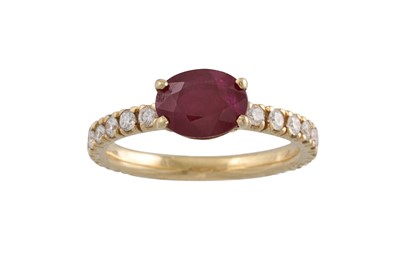 Lot 159 - A RUBY AND DIAMOND RING, the oval ruby to...