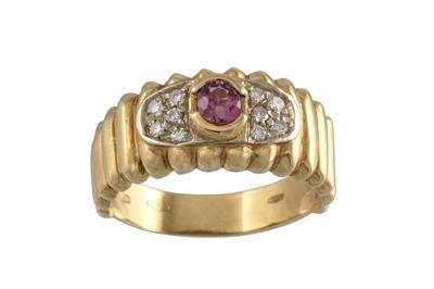 Lot 162 - A RUBY AND DIAMOND RING, the circular ruby to...