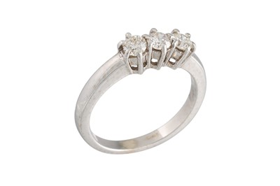 Lot 164 - A DIAMOND THREE STONE RING, mounted in 18ct...