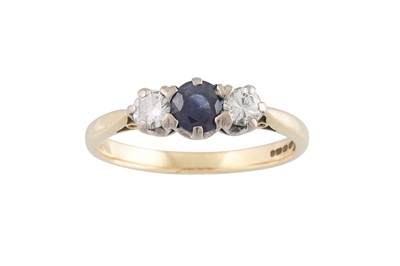 Lot 119 - A SAPPHIRE AND DIAMOND THREE STONE RING, the...