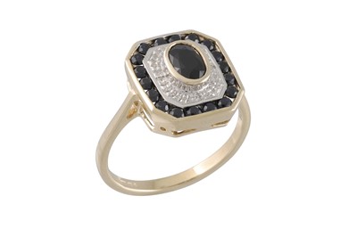 Lot 20 - A DIAMOND AND SAPPHIRE CLUSTER RING, of square...