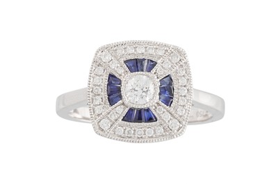 Lot 69 - A DIAMOND AND SAPPHIRE RING, of square plaque...