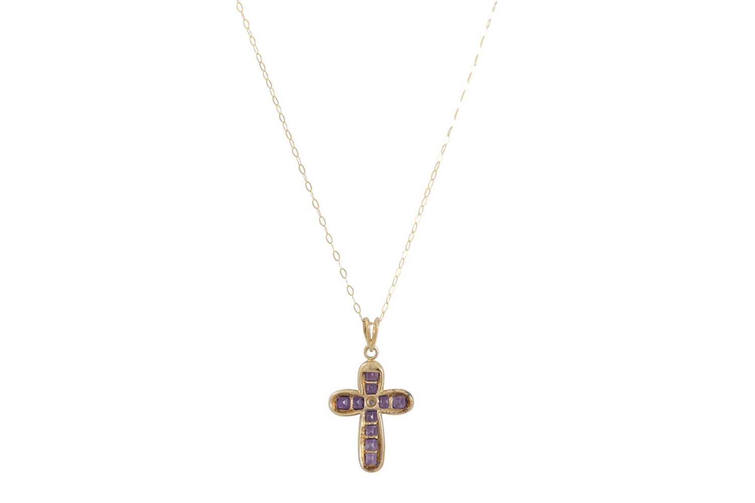 Lot 73 - A DIAMOND AND AMETHYST CROSS, on a gold chain,...