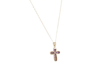 Lot 73 - A DIAMOND AND AMETHYST CROSS, on a gold chain,...