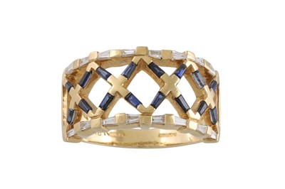 Lot 76 - A DIAMOND AND SAPPHIRE RING, of openwork...